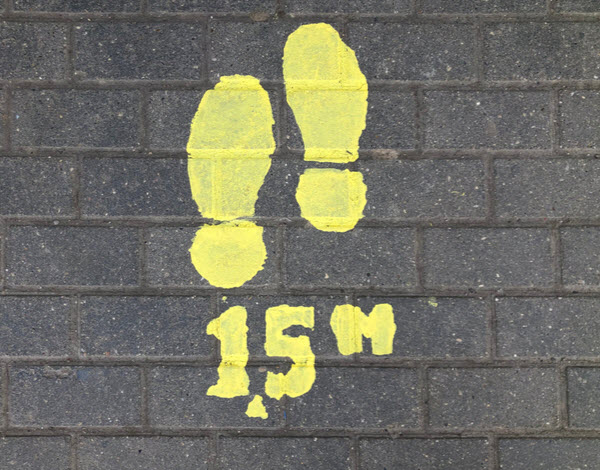 Yellow footsteps with number 1.5m