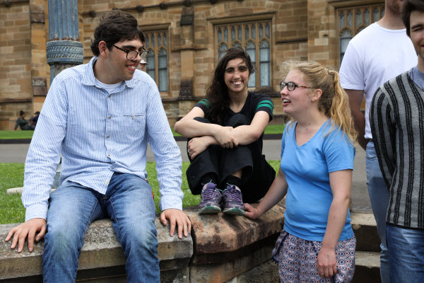 Young people happily talking and relaxing