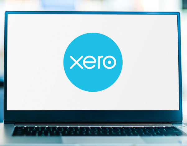 : Laptop computer displaying logo of Xero,